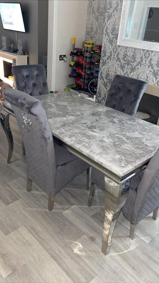 Asmara 150cm Marble Table with Slim Quilted Lion Knockerback Chairs